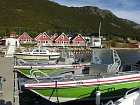 Senja Havfiskecenter - pohled na chaty od mola