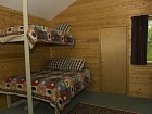 Redoubt Bay Lodge - loznice s patrovou posteli