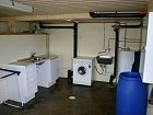 Technická místnost, prostor pro uložení a sušení oblečení a ryb. potřeb, pračka