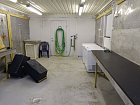 mistnost na zpracovani ulovku a ulozeni rybarskeho vybaveni v suterenu domku