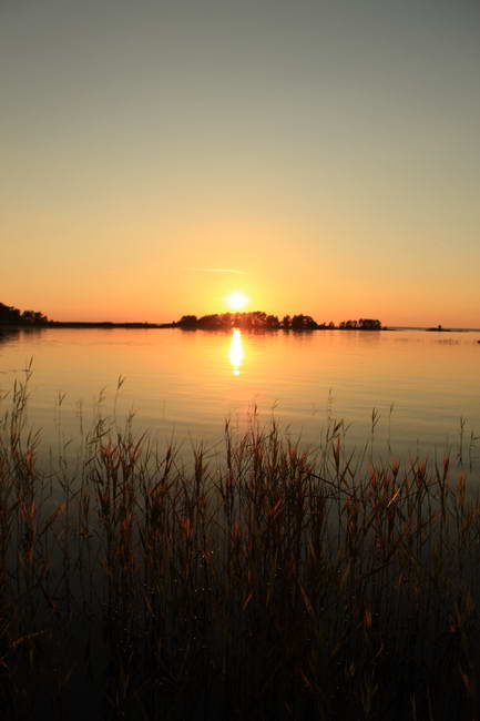 zapad slunce nad jezerem Vanern